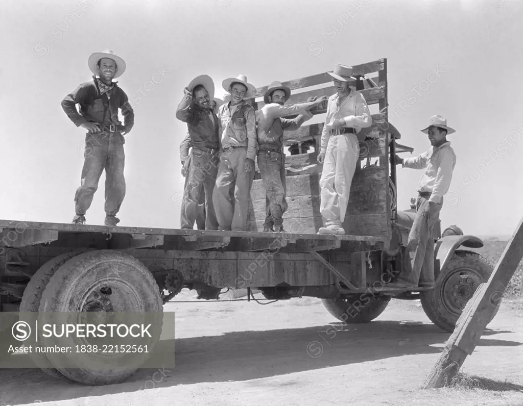 Group of Mexican Laborers on Flatbed Truck after a day in Melon Fields, Imperial Valley, California, USA, Dorothea Lange, Farm Security Administration, June 1935