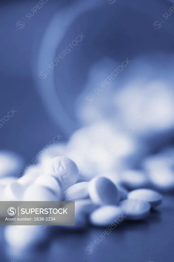 Pills Spilling From Bottle