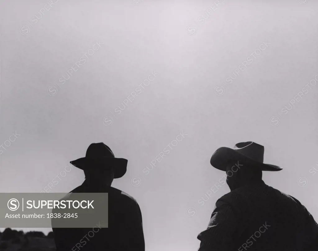 Silhouette of Two Cowboys