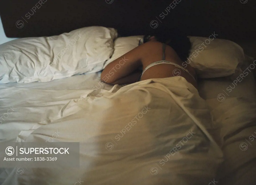 Girl Sleeping in Bed