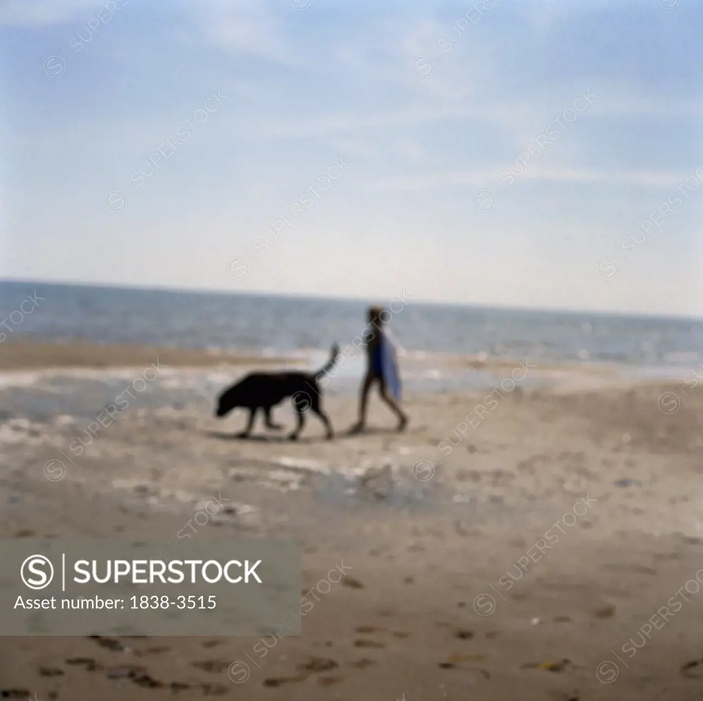 Boy and Dog on Beach
