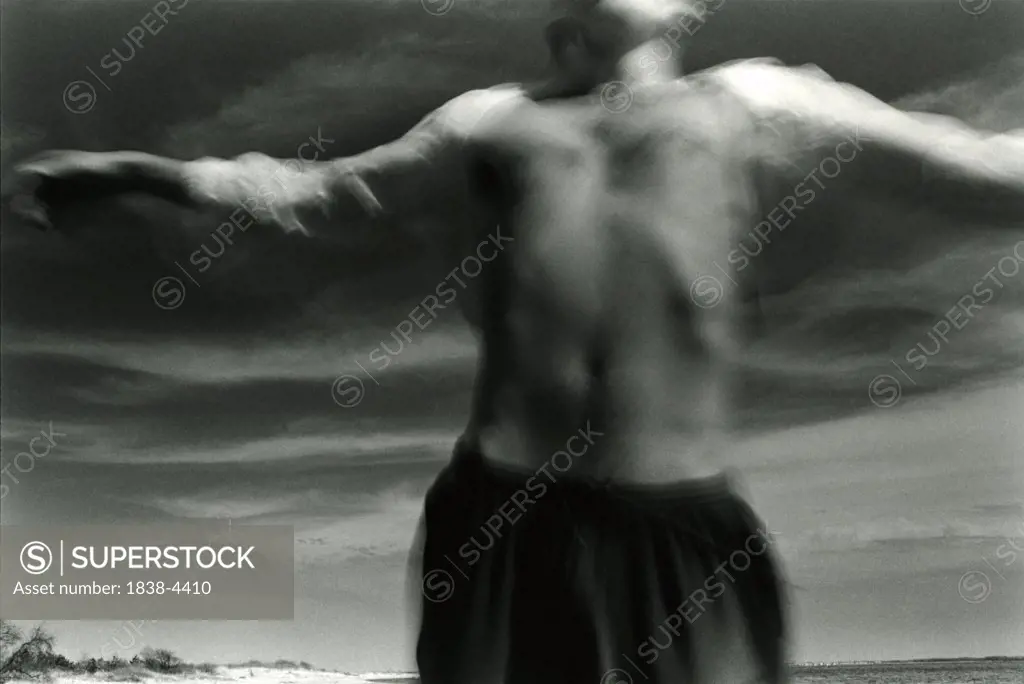 Man with Open Shirt Jumping 