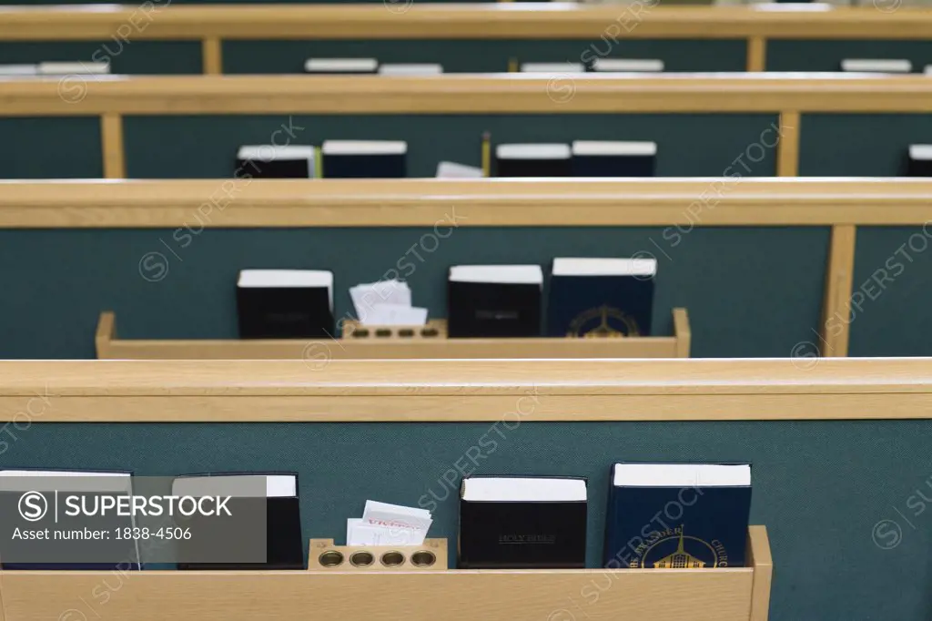 Church Pews with Bibles and Hymnals