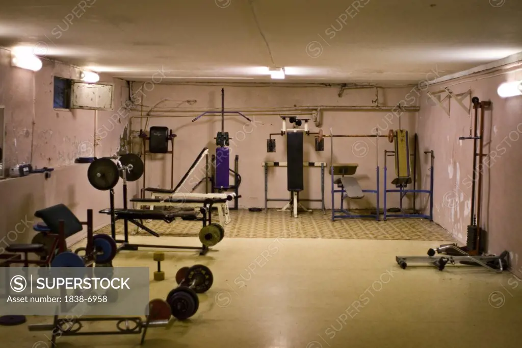 Basement With Old-Fashioned Weightlifting Equipment