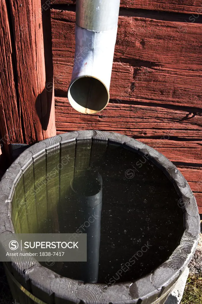 Drainpipe and Water Barrel