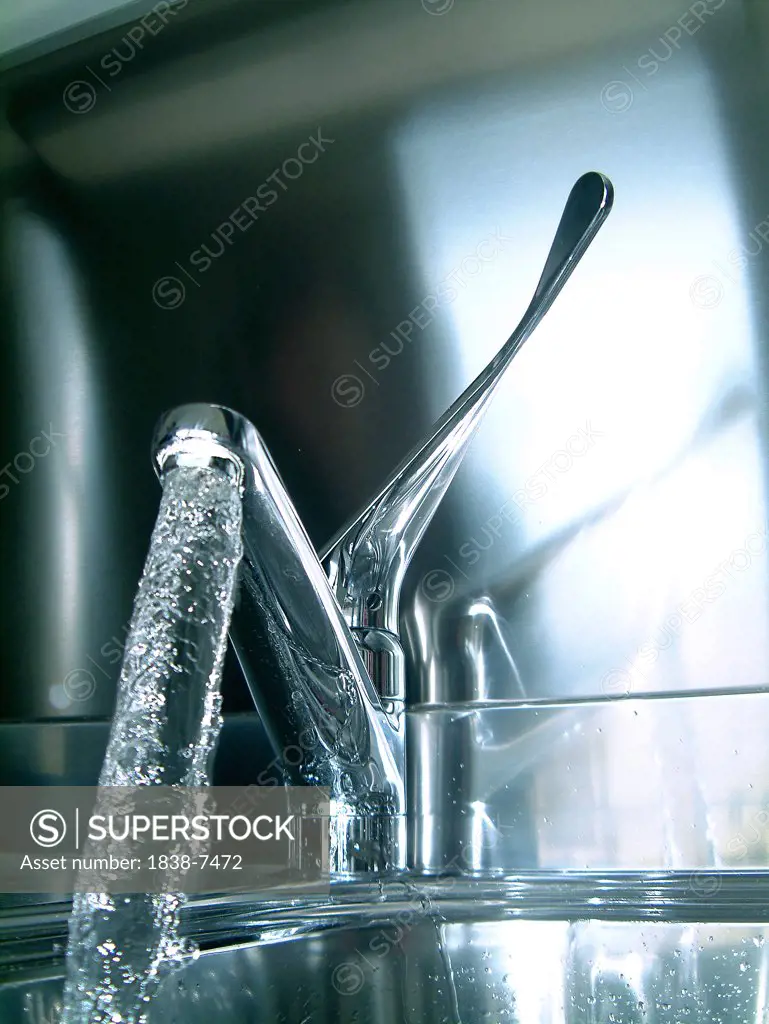 Water Pouring Out Of Kitchen Faucet