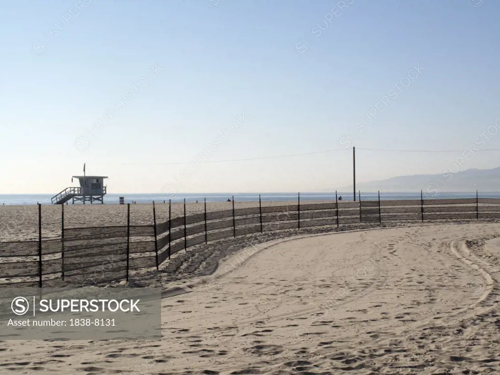 Sand Beach With Mesh Fence Barrier, Venice Beach, California, USA