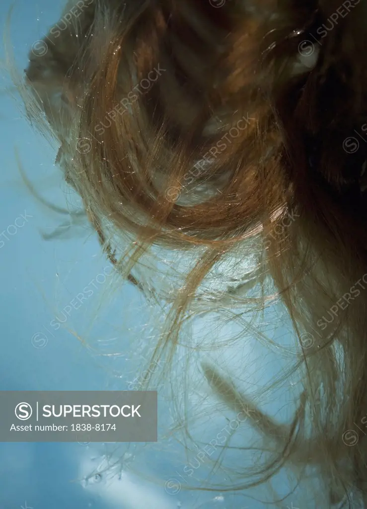 Woman With Long Blonde Hair Underwater