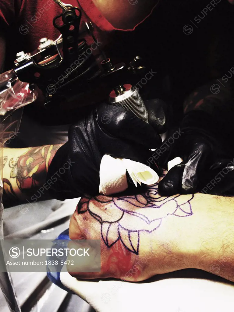 Tattoo Being Applied to Man's Wrist