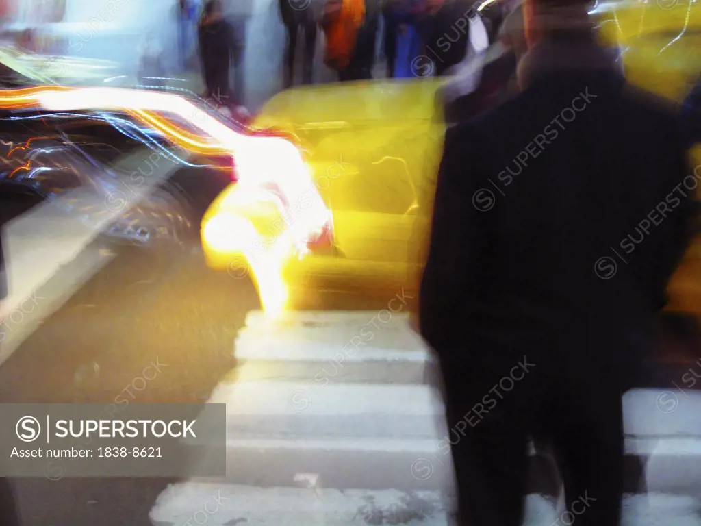 Blurred Street Scene With Taxi and Person Waiting to Cross Street, Manhattan, New York City, USA