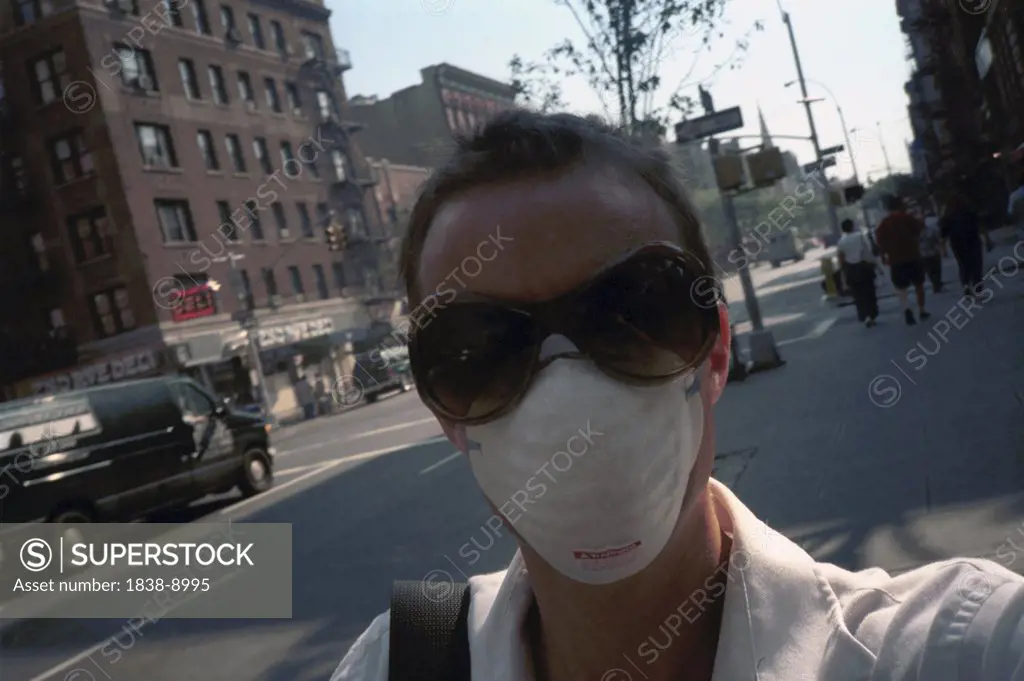 Young Man Wearing Face Mask and Sunglasses, New York City, USA