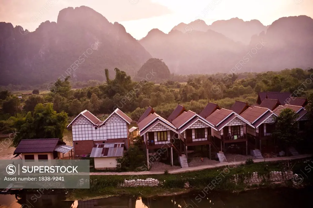 Small Cottages and Mountains at Sunset, Laos, Asia