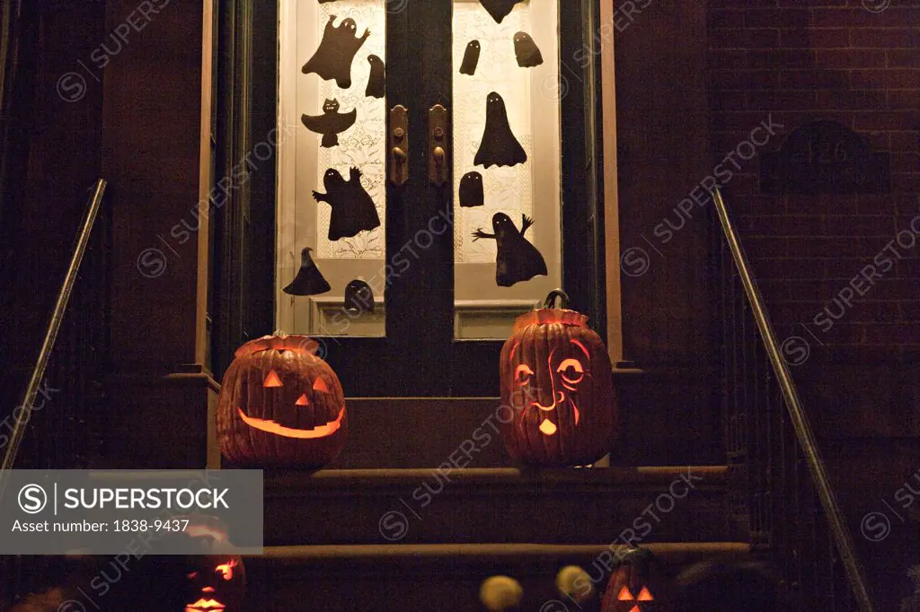 Pumkins on Stoop Halloween Night, New York City, USA