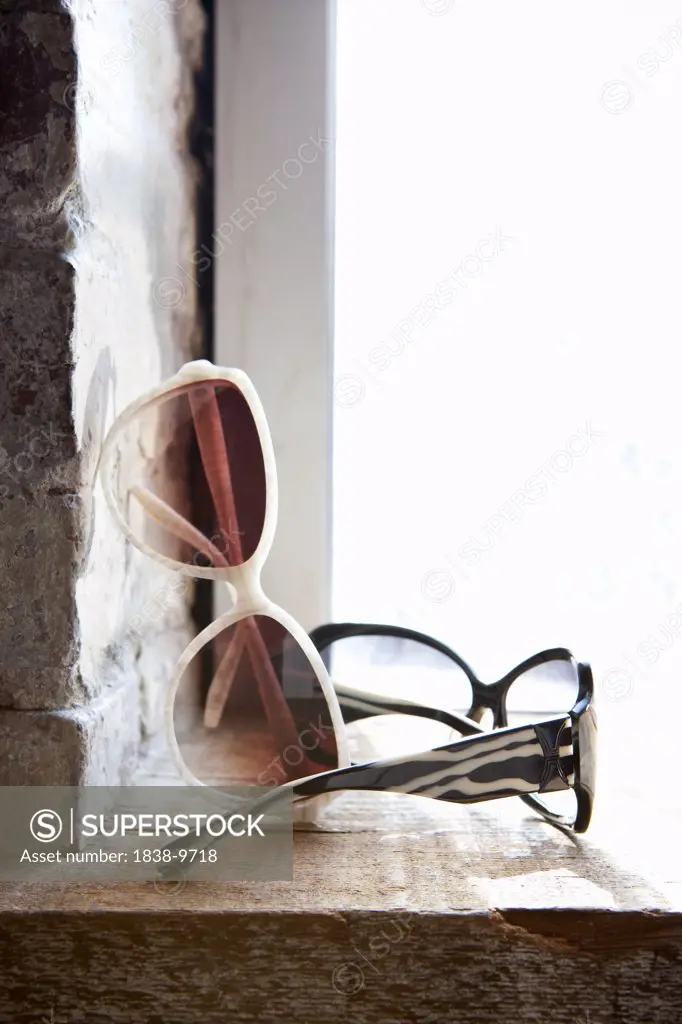 Sunglasses on Windowsill