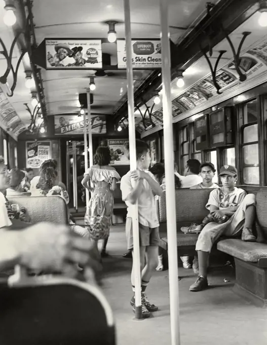 Passengers on Subway, Young Boy holding onto Pole, Brooklyn, New York City, New York, USA, Angelo Rizzuto, Anthony Angel Collection, June 1949