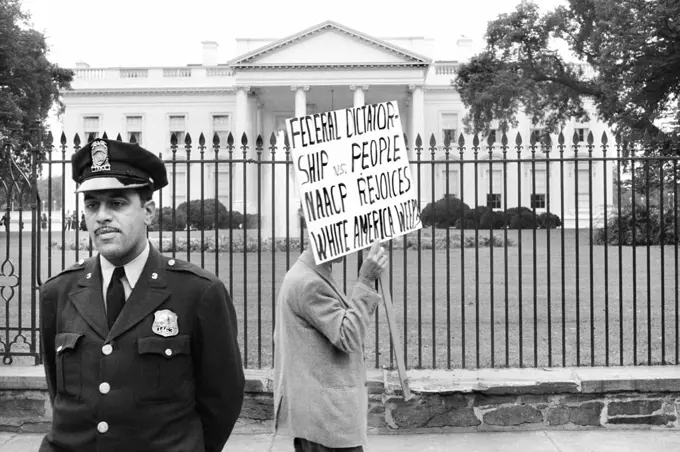 Man protesting for  John Kasper, an American far-right activist and Ku Klux Klan member who took a militant stand against racial integration during the civil rights movement, Washington, D.C., USA, Thomas J. O'Halloran, U.S. News & World Report Magazine Photograph Collection , October 1957