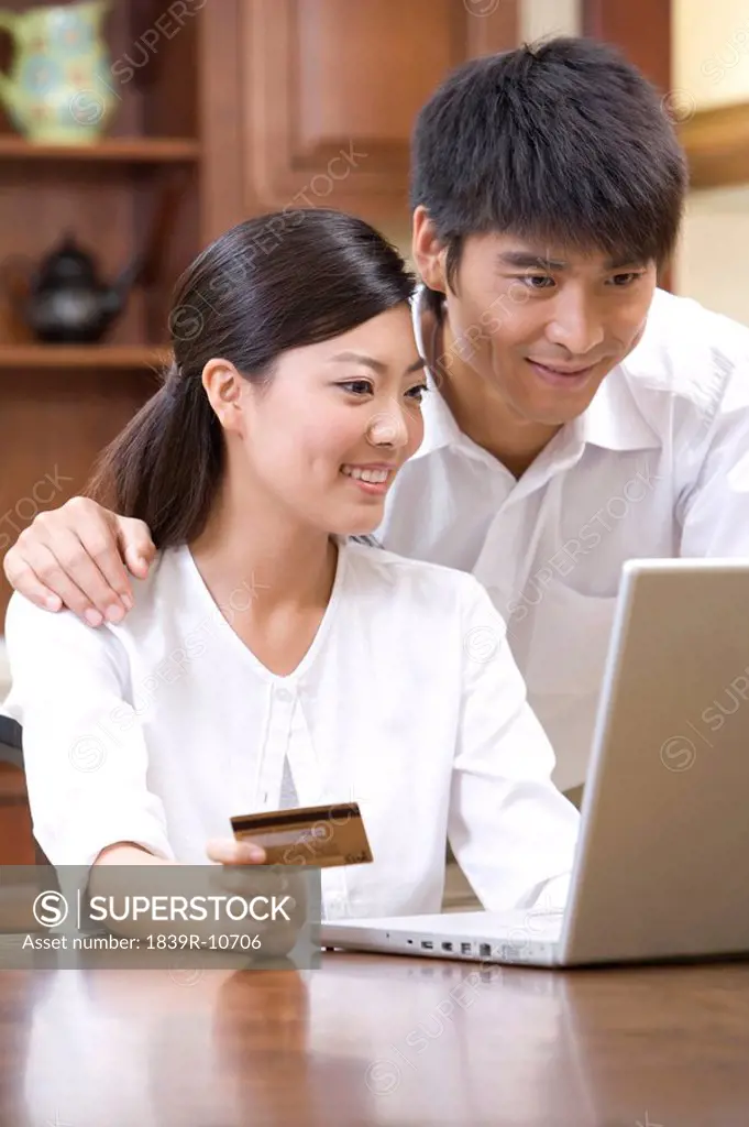 Young couple shopping online