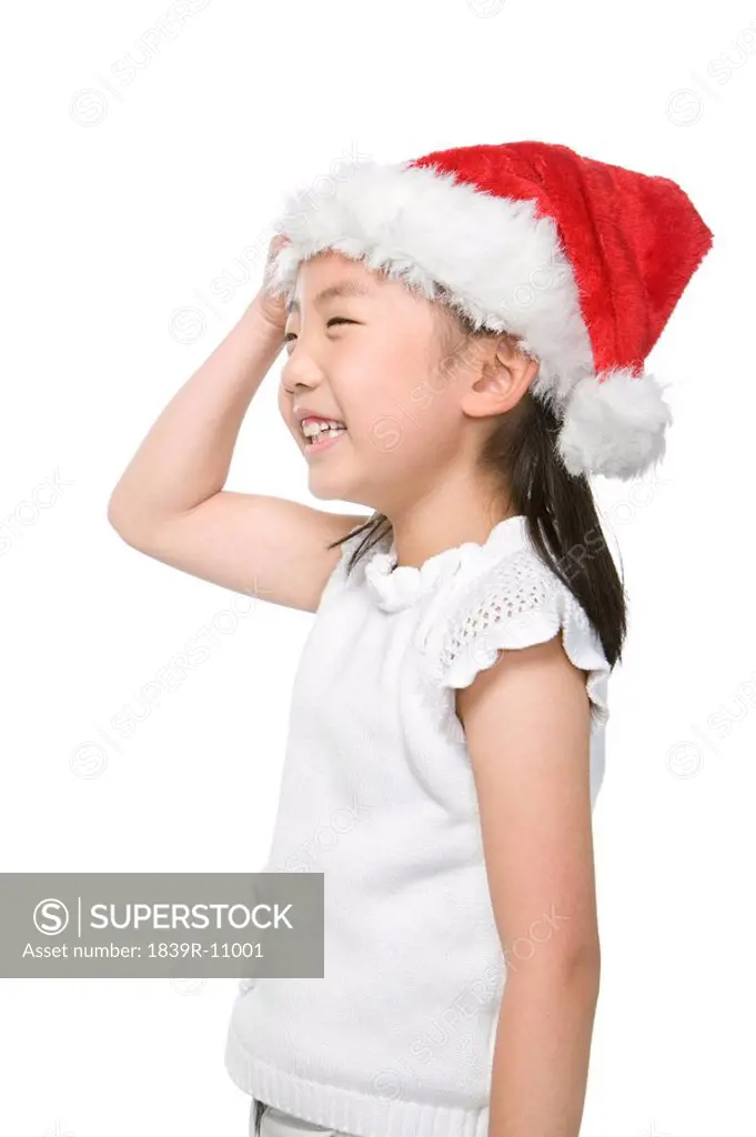 Portrait of girl with Santa hat