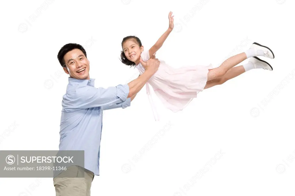 Father and daughter playing