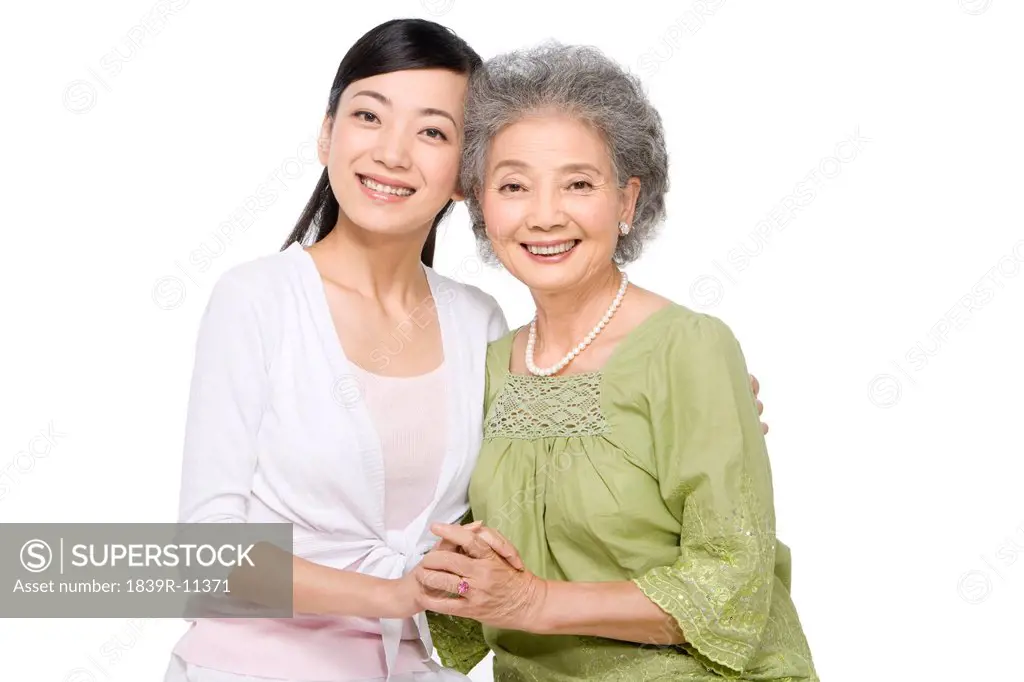 Portrait of mother and adult daughter