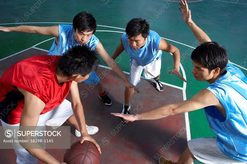 Basketball Team Playing Basketball