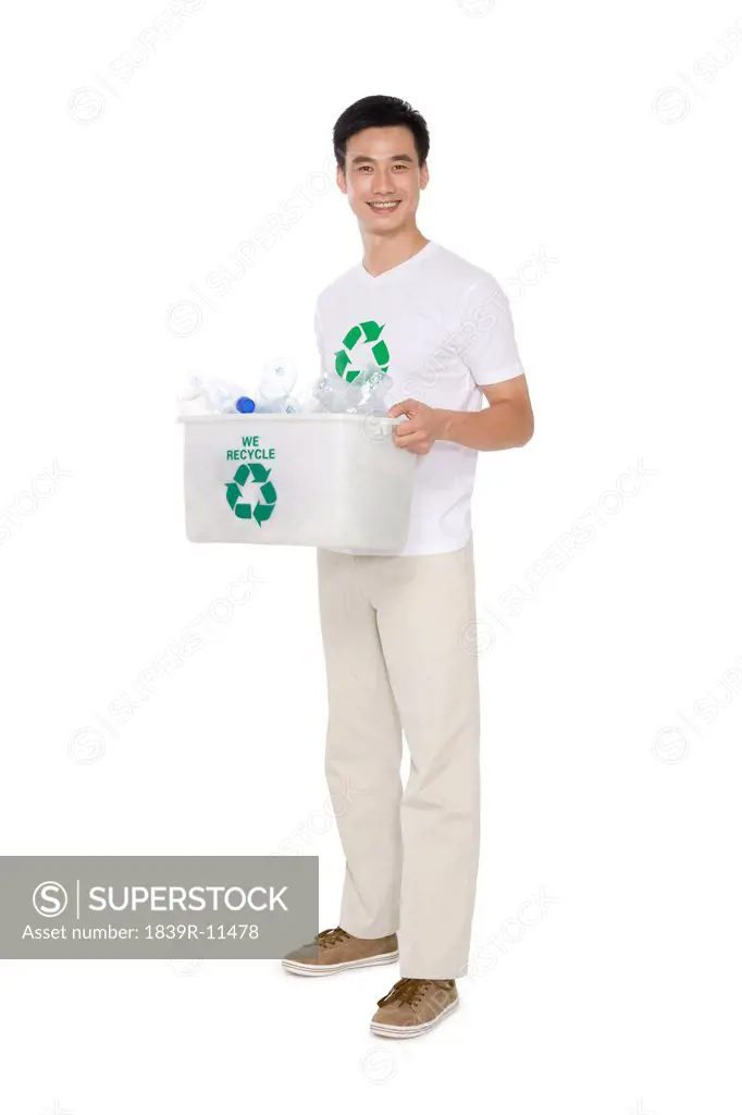 Mid_Adult man recycling