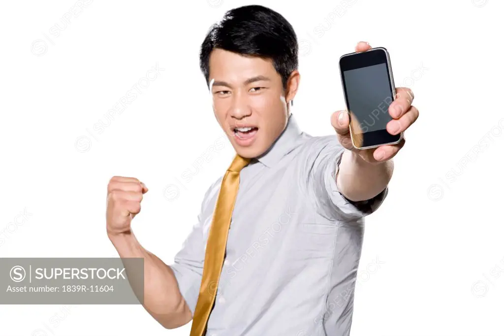 Businessman holding iPhone