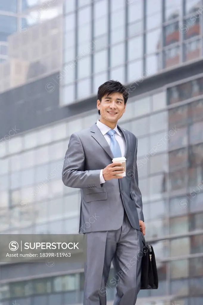 Chinese businessman walking
