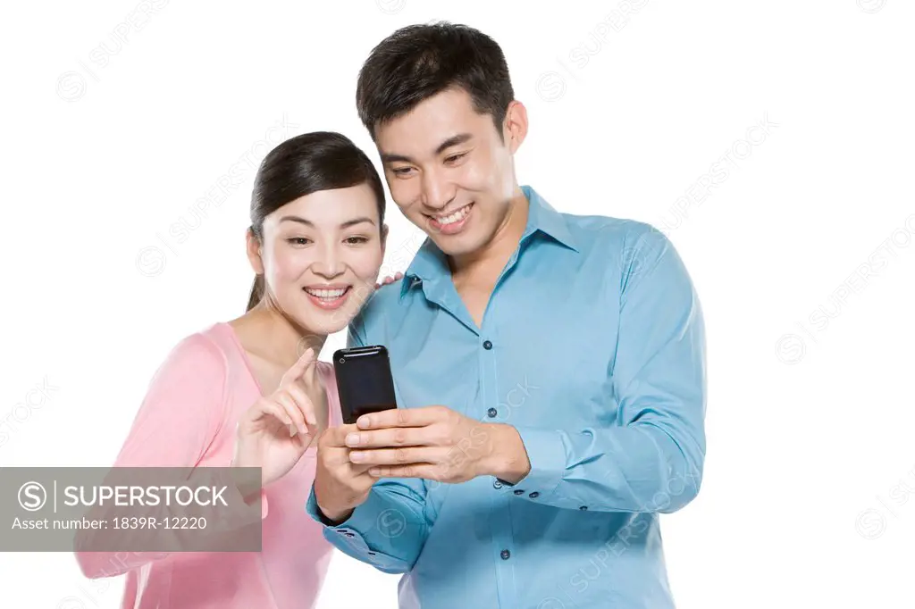 Couple Looking At Phone
