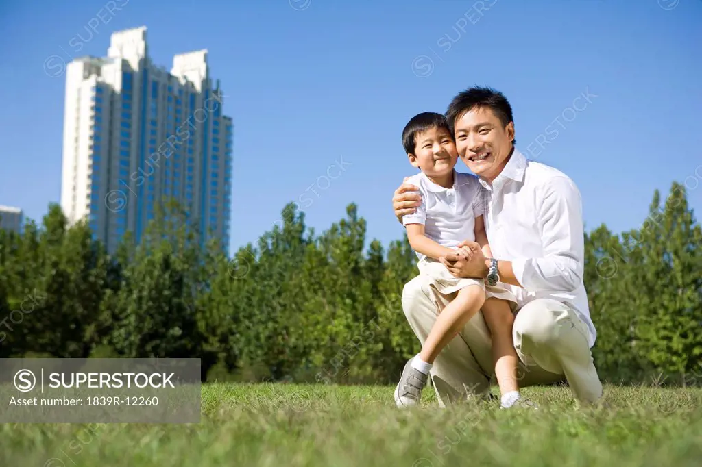 Father and son playing at the park