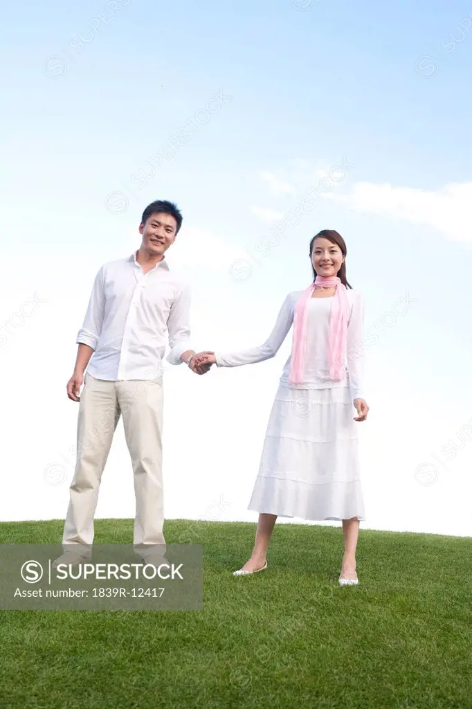 Young couple enjoying the park