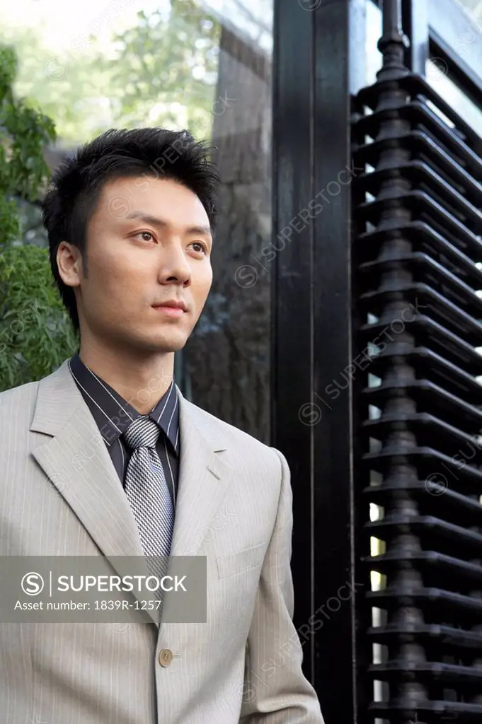 Businessman Standing Outside A Building
