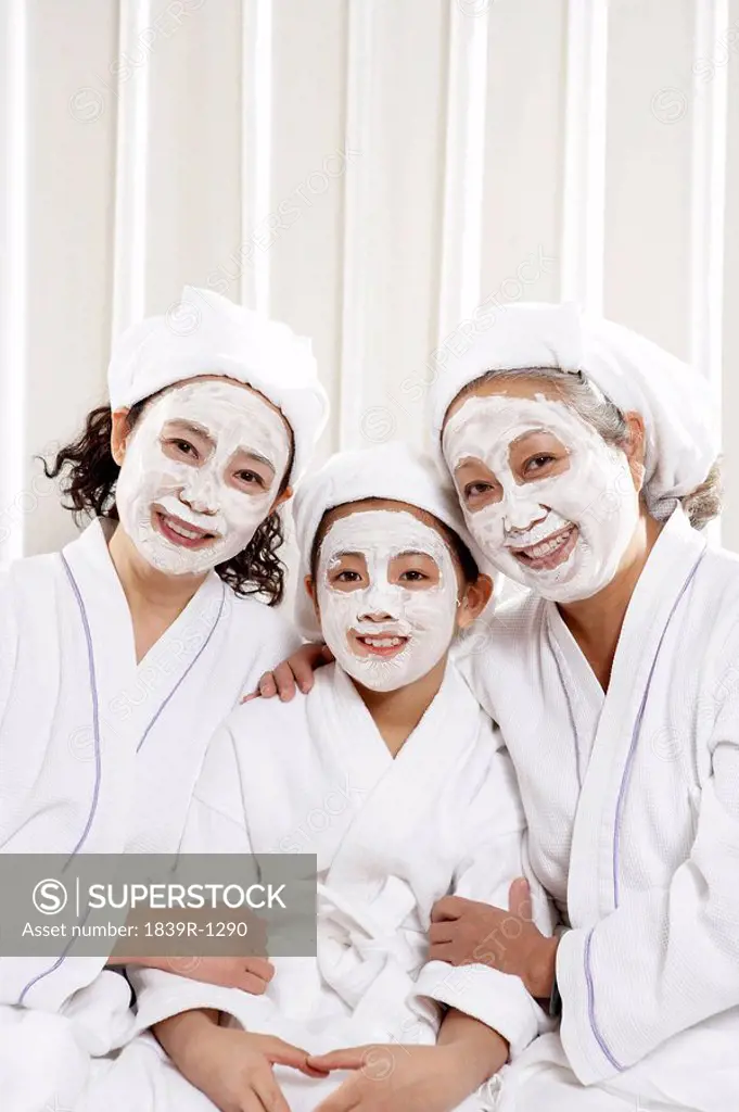 Women And Young Girl With White Facial Masks