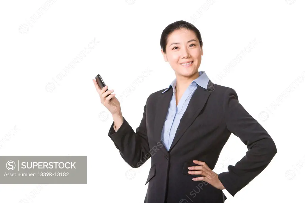 Businesswoman holding mobile phone