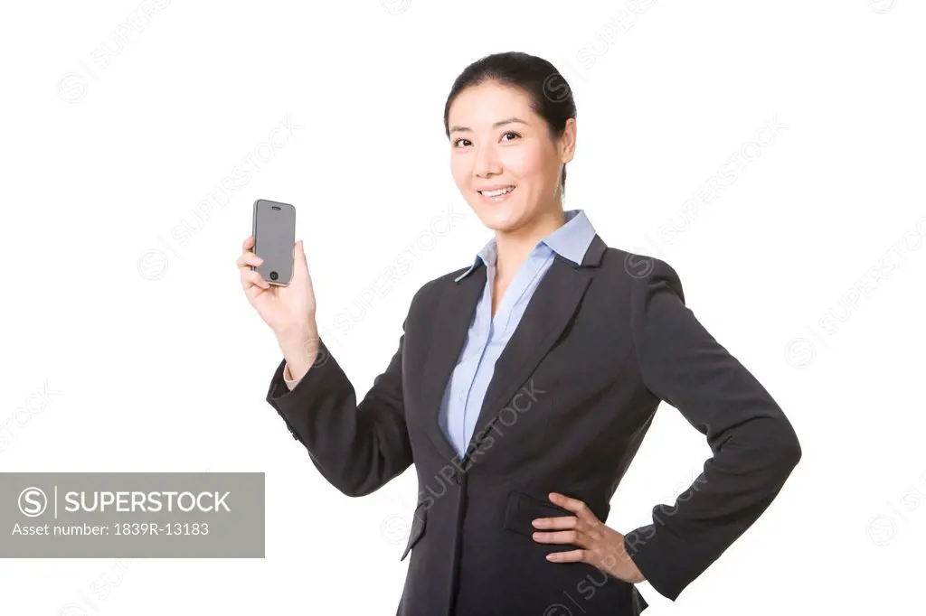 Businesswoman holding mobile phone
