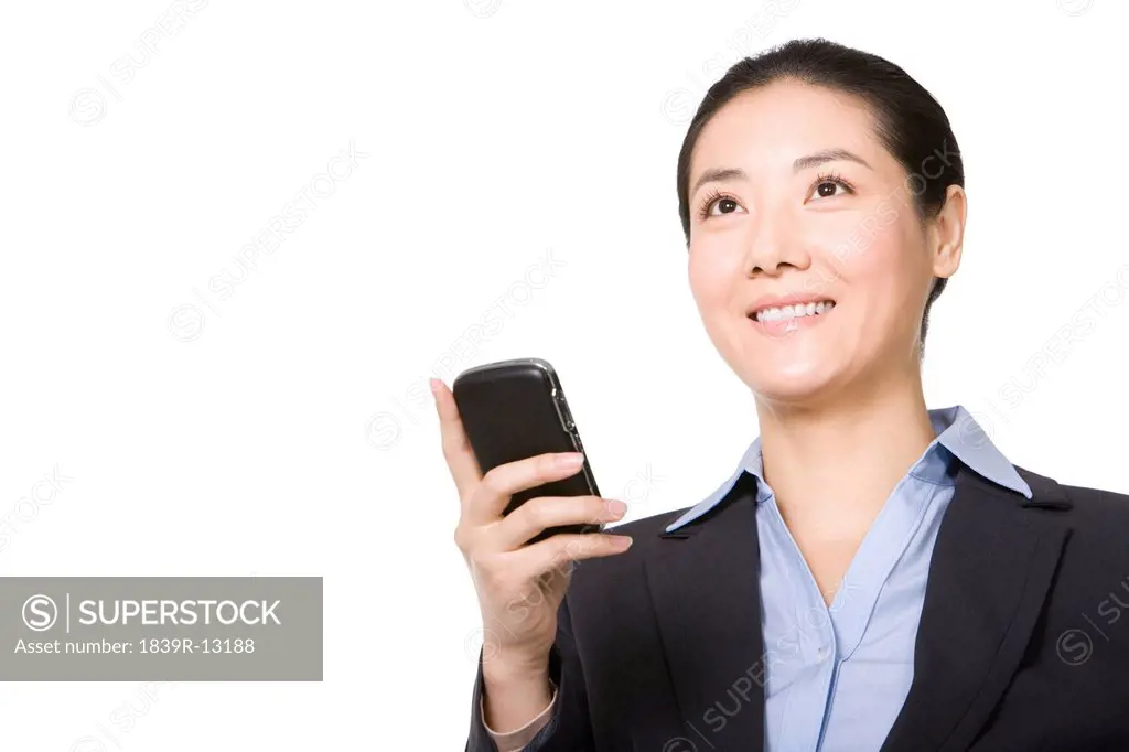 Businessowman using mobile phone