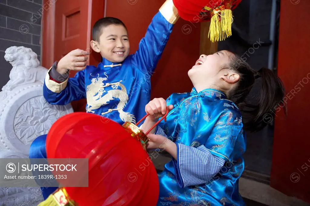 Children Playing With Lanterns