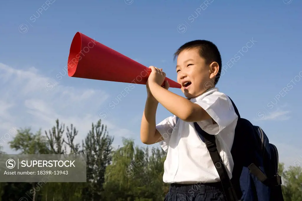 Boy with a red megaphone