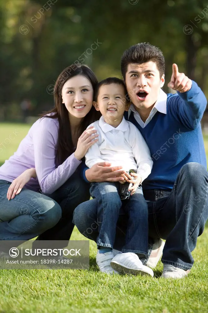 Portrait of young family at the park