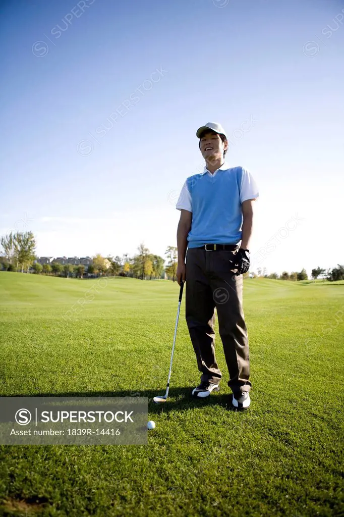 Golfer standing on the golf course