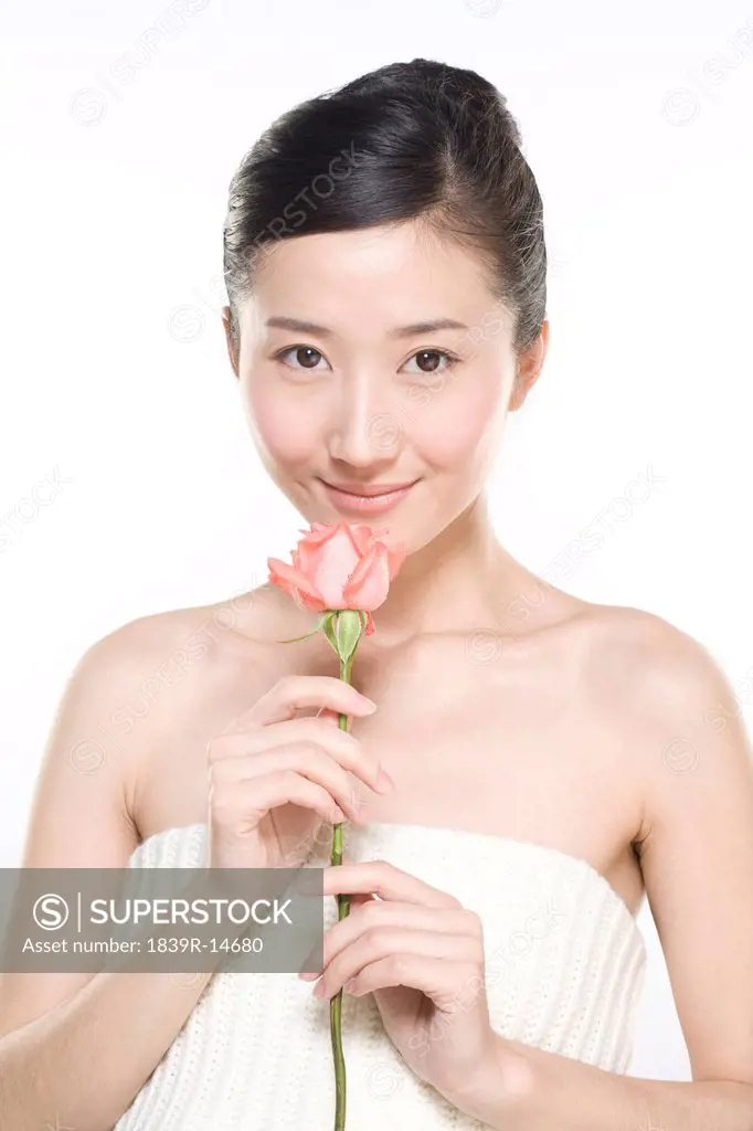 Beauty shot of a young woman with flowers in her hair
