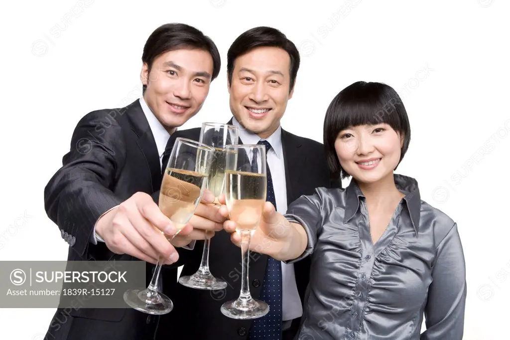 Business team toasting with champagne