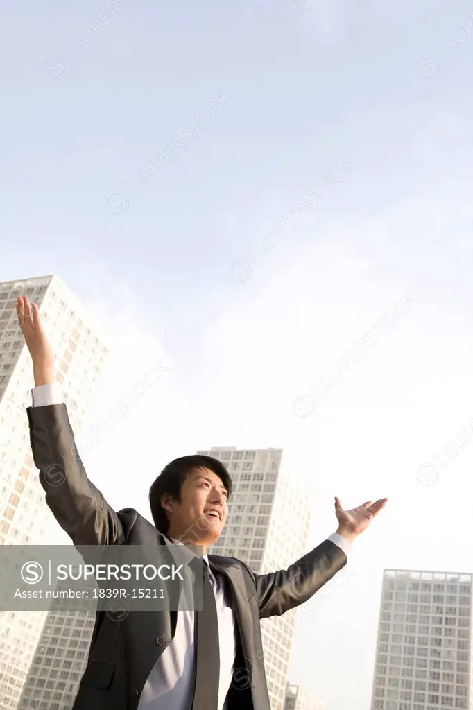 Businessman Arms Outstretched