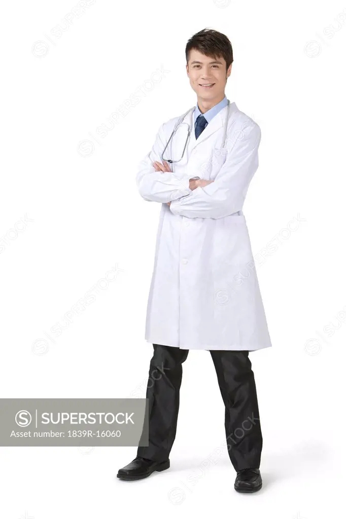 Confident young doctor in labcoat
