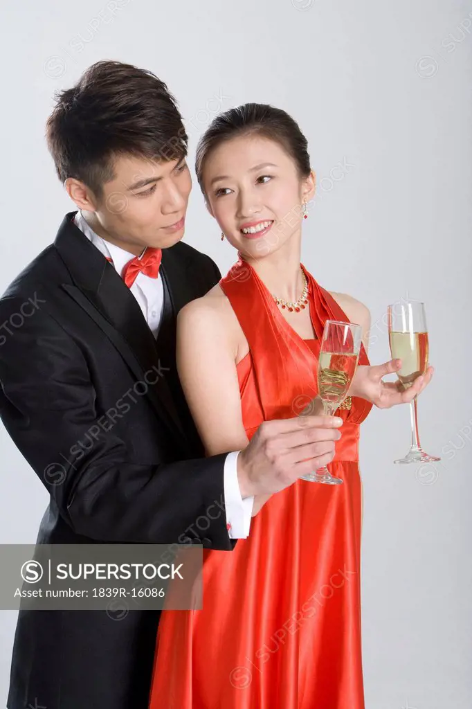 Young couple in evening wear