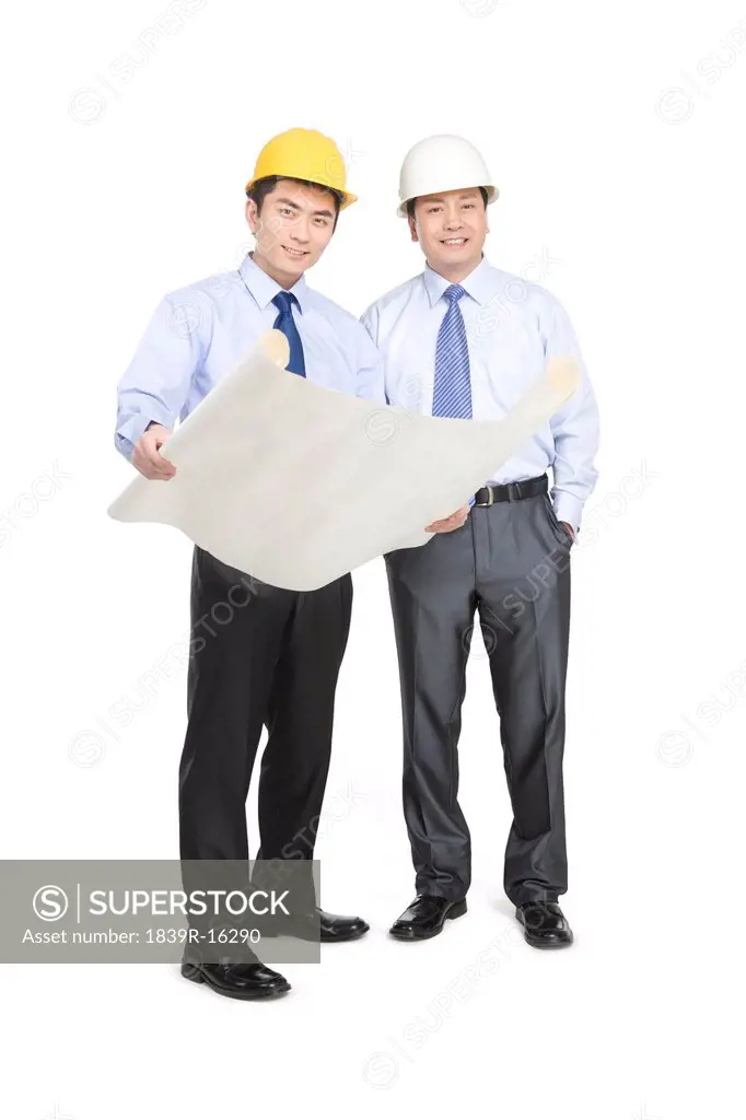 Construction managers in hard hats