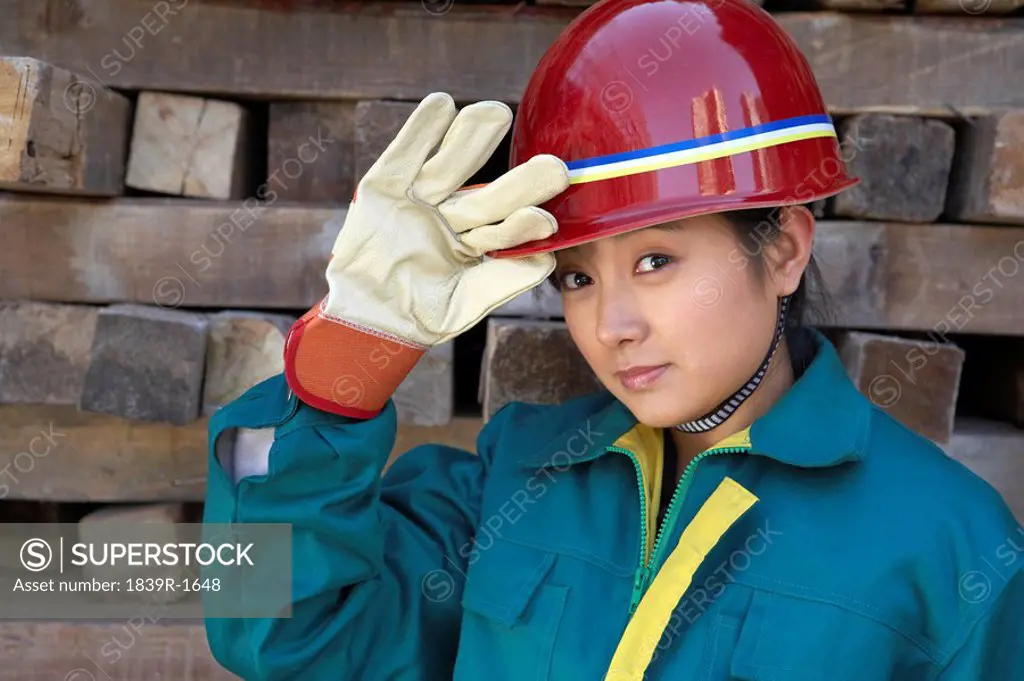 Worker Wearing A Hard Hat In A Construction Site
