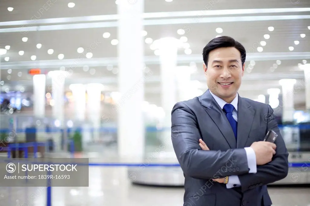Portrait of businessman at the airport