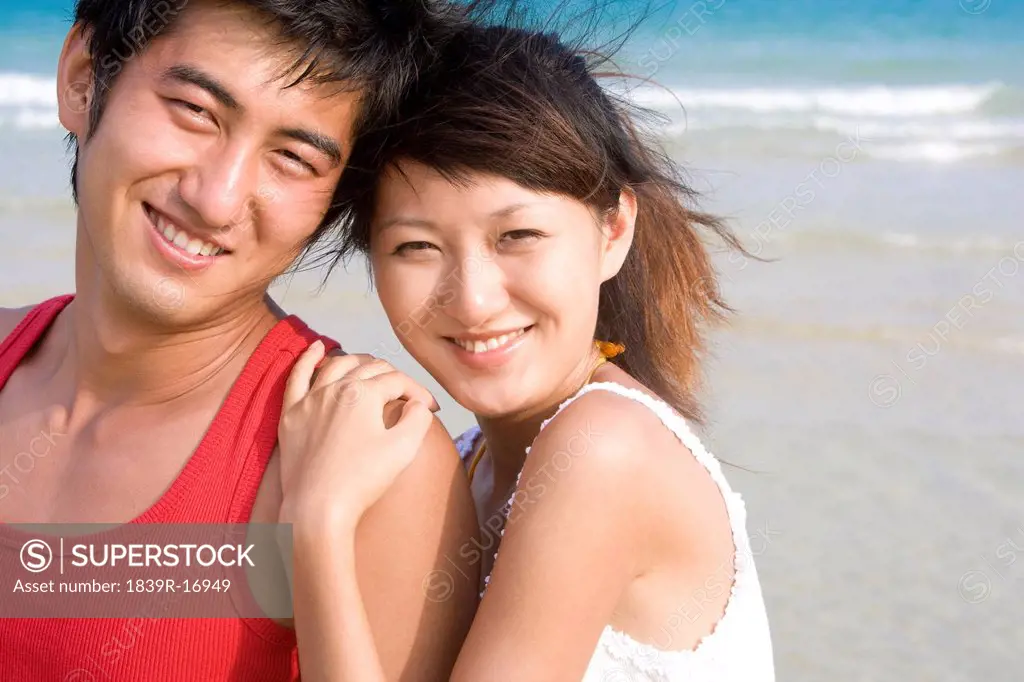 Portrait of a young couple at the beach