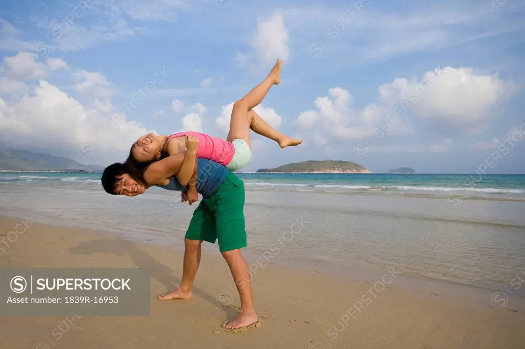 Portrait of a young couple at the beach